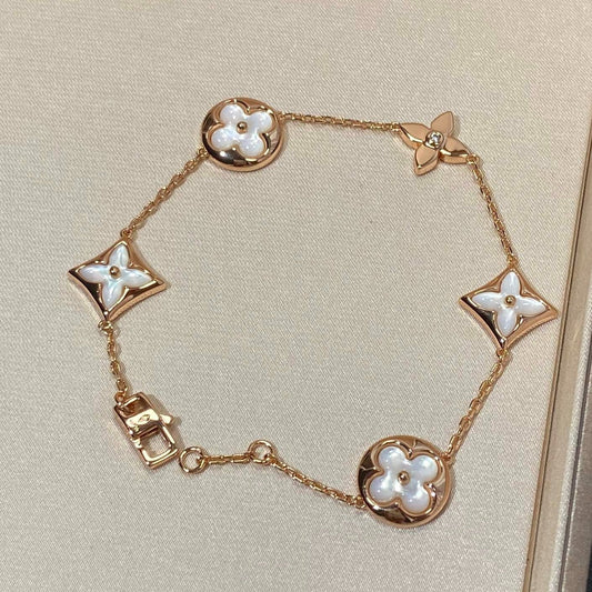 [moco jewelrys]STAR AND SUN 5 MOTIF MOP PINK GOLD BRACELET