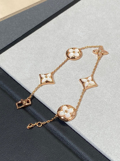 [moco jewelrys]STAR AND SUN 5 MOTIF MOP PINK GOLD BRACELET