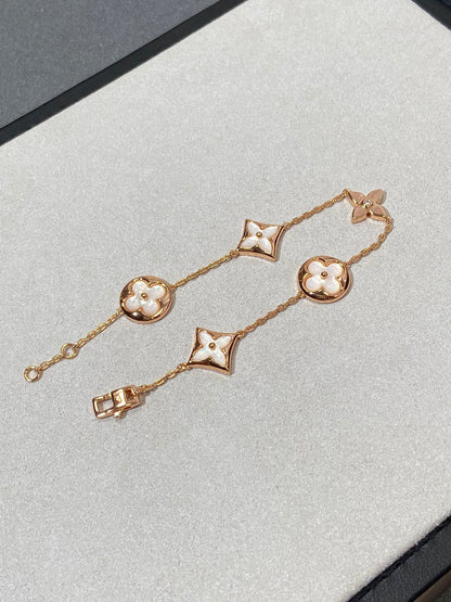 [moco jewelrys]STAR AND SUN 5 MOTIF MOP PINK GOLD BRACELET